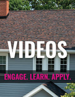 Grey house with an Owens Corning roof and label "VIDEOS" in front
