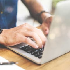 Image of a user looking at the computer