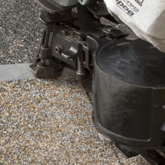 Image of Owens Corning Roofing being installed with a nailgun