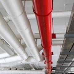 Red water sprinkler and pipes