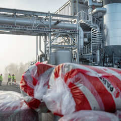 Paroc insulation with the Cortus Hoganas factory in the background
