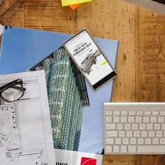 Collection of architecture design documents on a desk
