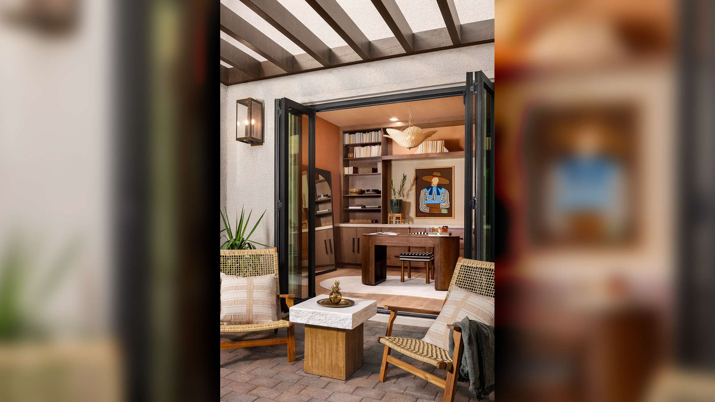 beautiful Las Vegas, Nevada home interior design, luxury sliding doors by Fleetwood living area extending into exterior patio