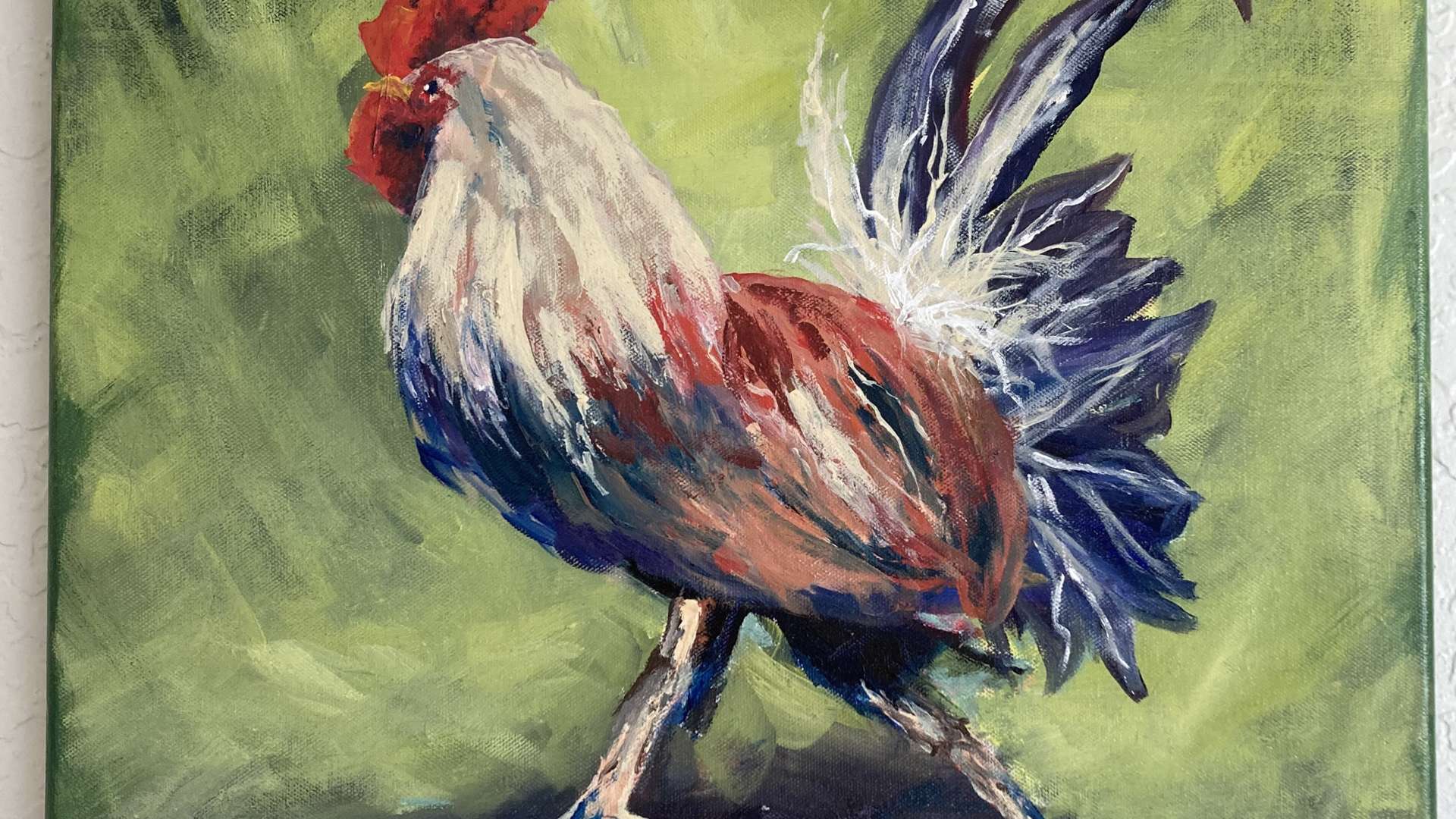   Painting of a colorful rooster with red, white, and blue feathers standing on a green background.