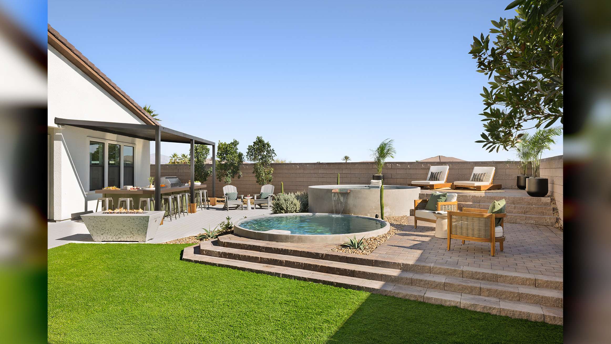 beautiful Las Vegas, Nevada home interior design, luxury sliding doors by Fleetwood living area extending into exterior patio