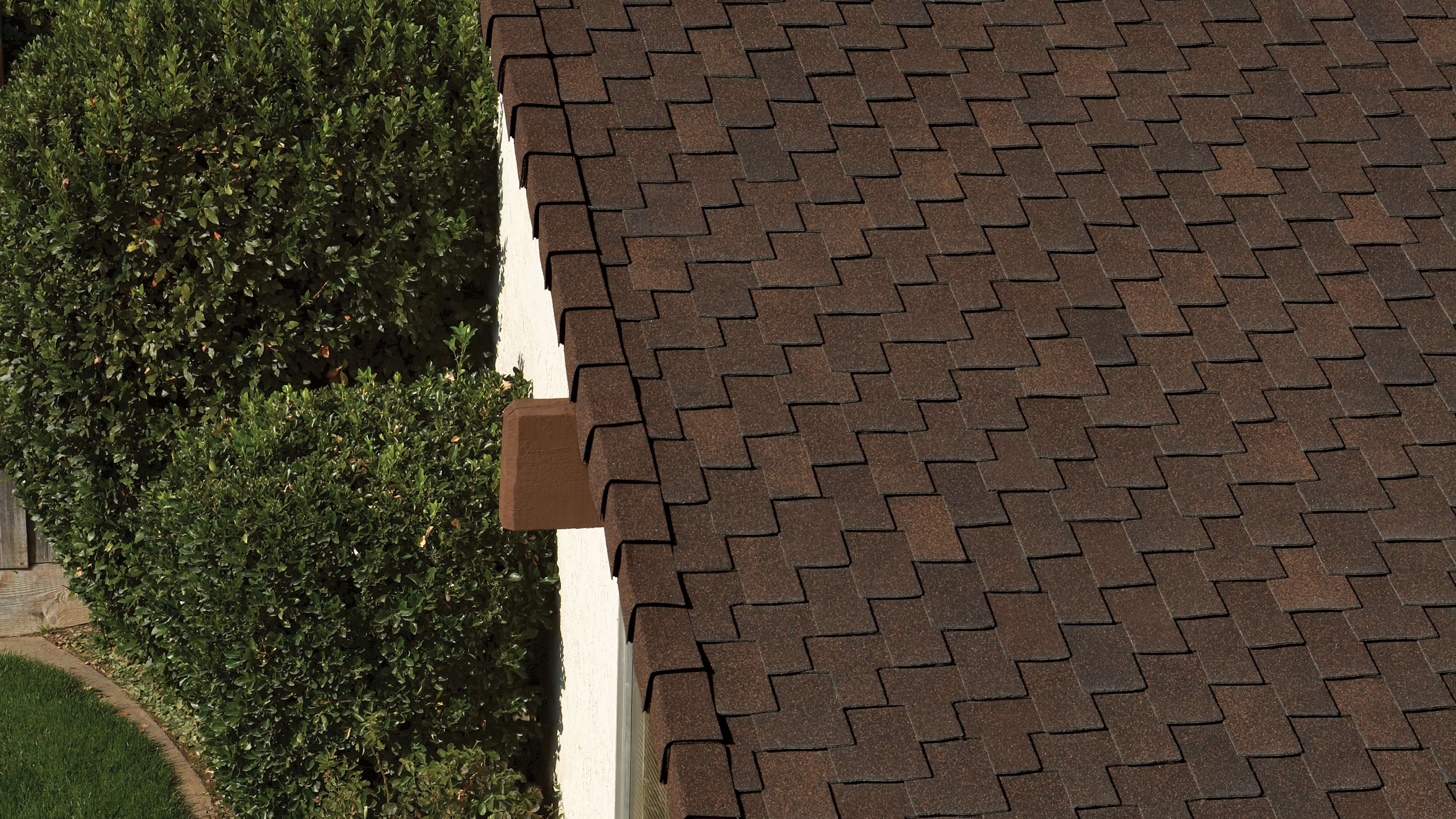 Close up of Woodmoor® Timber dark brown shingles