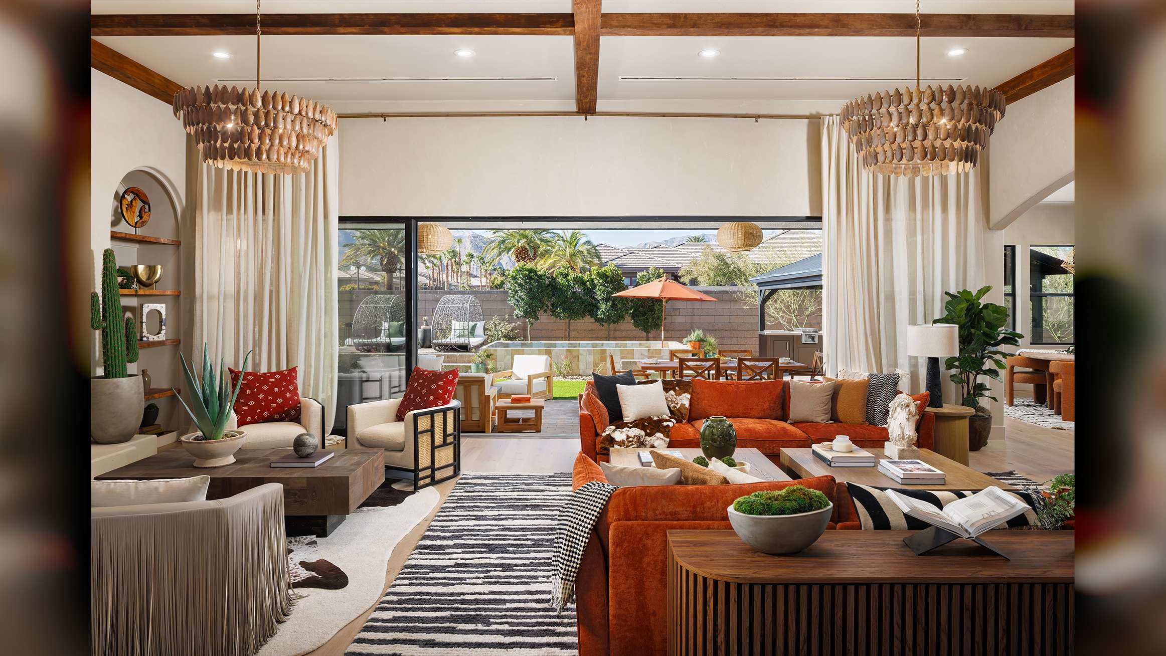 beautiful Las Vegas, Nevada home interior design, luxury sliding doors by Fleetwood living area extending into exterior patio
