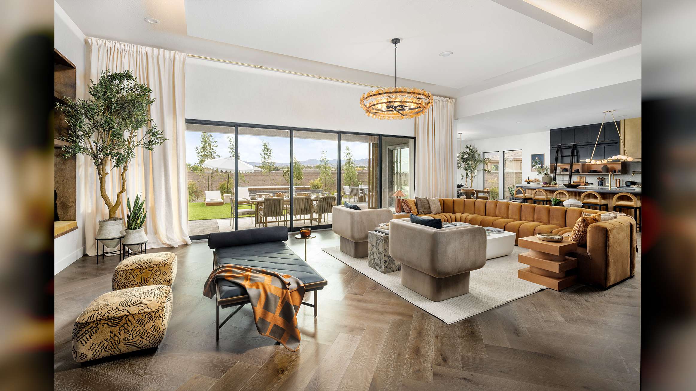 beautiful Las Vegas, Nevada home interior design, luxury sliding doors by Fleetwood living area extending into exterior patio