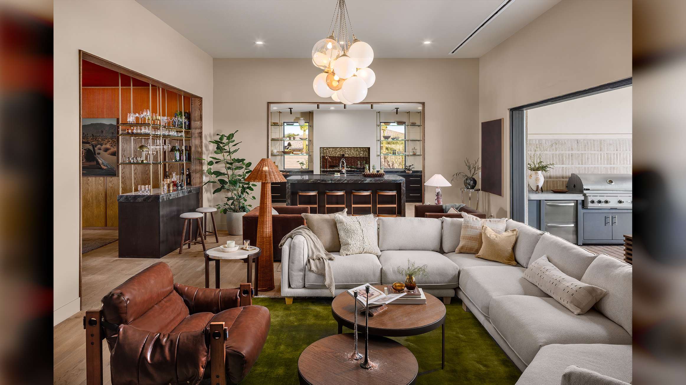 beautiful Las Vegas, Nevada home interior design, luxury sliding doors by Fleetwood living area extending into exterior patio