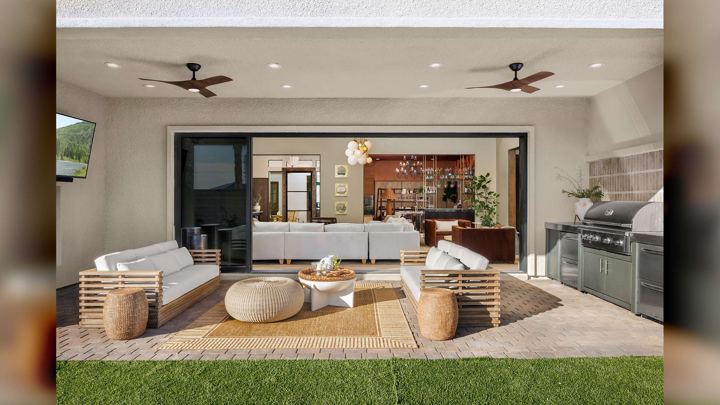 beautiful Las Vegas, Nevada home interior design, luxury sliding doors by Fleetwood living area extending into exterior patio