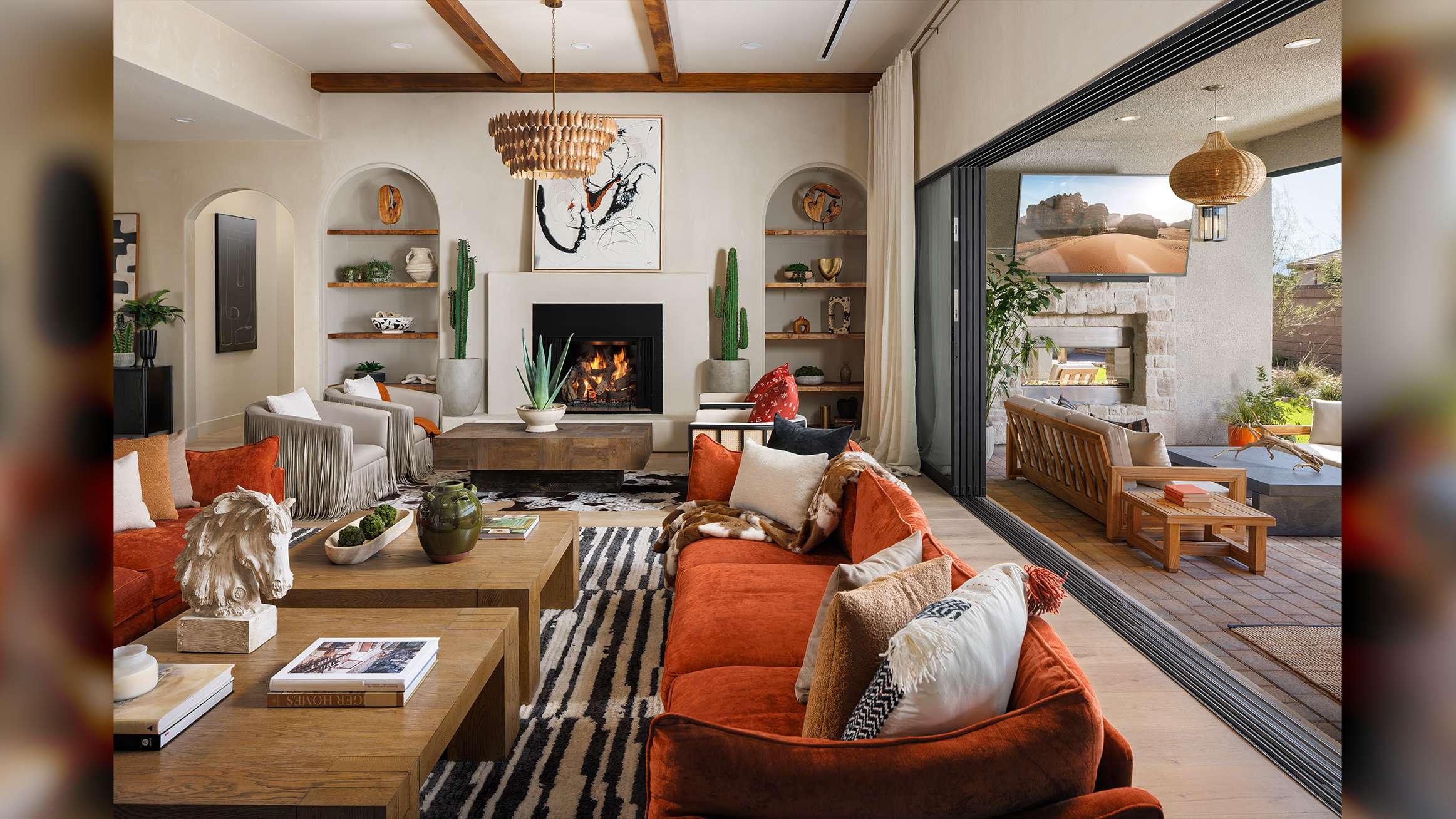 beautiful Las Vegas, Nevada home interior design, luxury sliding doors by Fleetwood living area extending into exterior patio