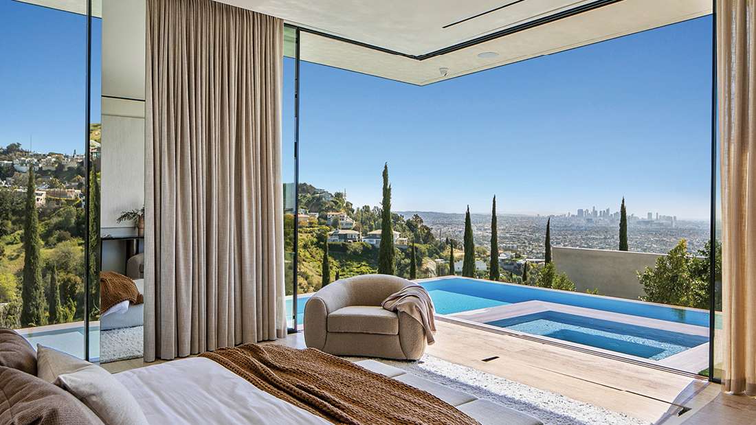 Luxury bedroom with panoramic city view, private infinity pool and spa, floor-to-ceiling glass walls, and modern neutral-toned decor.