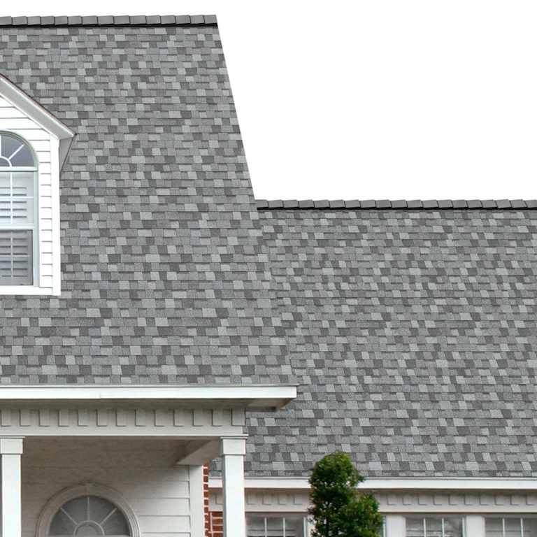 The porch entryway to a home depicts how well Slatestone Gray TruDefinition® Duration® gray, light gray, blue and black shingles pair with the white horizontal paneling and a woodgrain door with white columns.