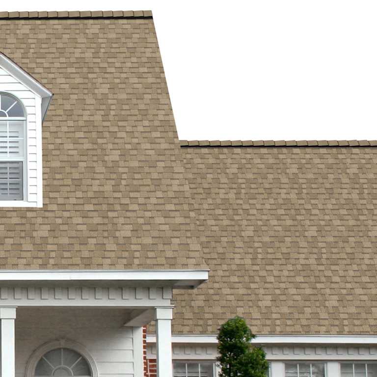 The porch entryway to a home depicts how well TruDefinition® Duration® Sand Castle dark gray, light grays, and red shingles pair with the white horizontal paneling and a woodgrain door with white columns.