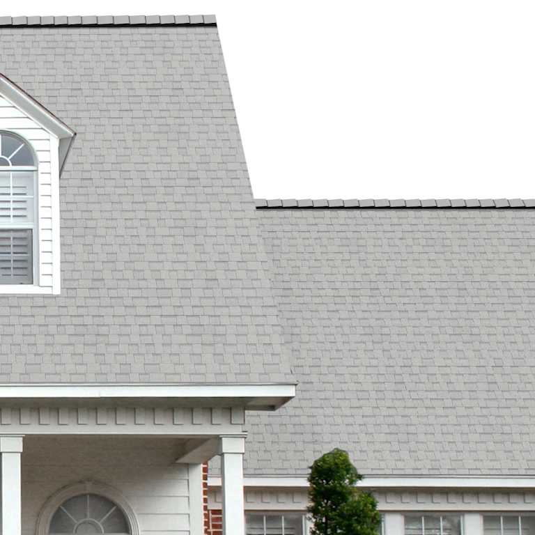 The porch entryway to a home depicts how well TruDefinition® Duration® Cool Shasta White light gray and white shingles pair with the white horizontal paneling and a woodgrain door with white columns.