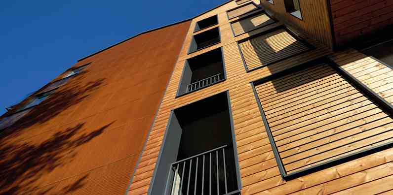 A wooden facade against a blue sky