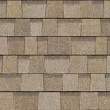 TruDefinition® Duration® Sand Castle shingles have an overall color of gray that is achieved by a mix of dark gray, light grays, and red granules.