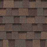 TruDefinition® Oakridge® Teak shingles have an overall color of dark brown that is achieved by a mix of golden tan, warm brown and gray granules.