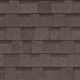 Oakridge® Teak shingles have an overall color of dark brown that is achieved by a mix of golden tan, warm brown and gray granules.