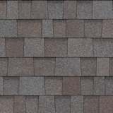 Las tejas TruDefinition® Duration® COOL Plus Rolling Stone tienen un color generalizado gris amarronado cálido que se logra al mezclar gránulos gris oscuro, marrón medio y marrón oscuro.