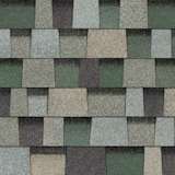 TruDefinition® Duration® Designer Evergreen Mist shingles have an overall color of green that is achieved by a mix of green, light blue, golden tan, and black granules.