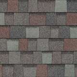 TruDefinition® Duration® Colonial Slate shingles have an overall color of gray that is achieved by a mix of dark gray, light grays, and red granules.