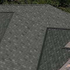 Granite Woodcrest shingles on a steep slope roof.