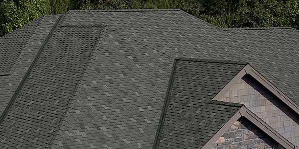 Granite Woodcrest shingles on a steep slope roof.