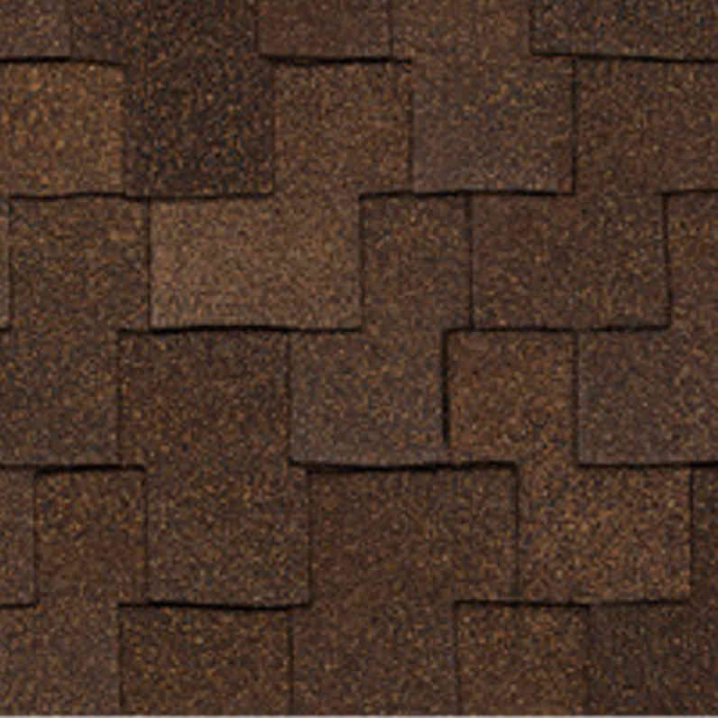Woodmoor® Woodcrest® Timber shingles have an overall color of dark brown that is achieved through a mix of golden tan, brown, and black granules