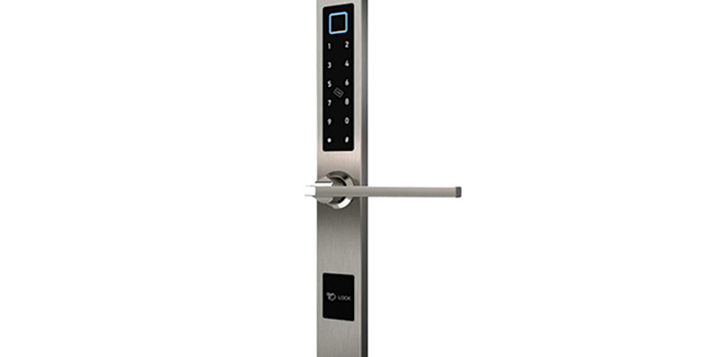 Stainless steel door handle and electronic plate with a black keypad for the Fleetwood 3200-T Swing Door