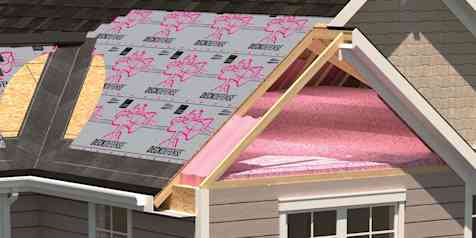 Residential roof with shingles torn away to reveal underlayment products on the roof.