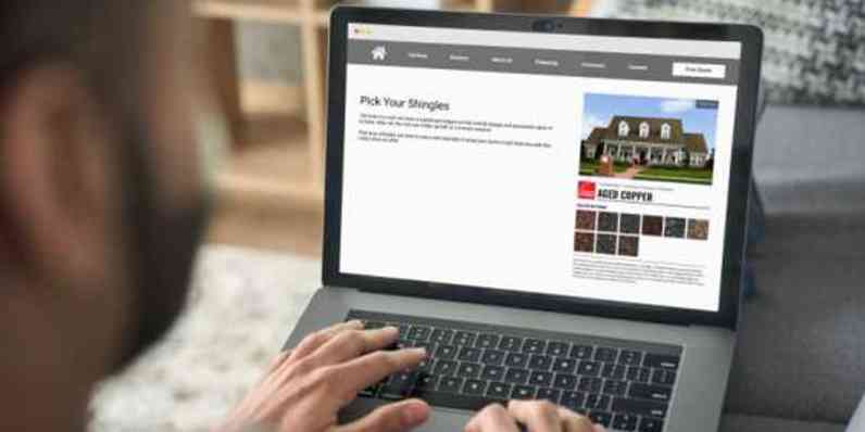 Photo of a person using a laptop using the Owens Corning Pick Your Shingles widget