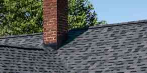 Close up view of roof line with Midnight Plum shingles from Owens Corning Duration shingle line