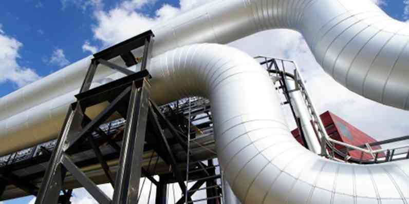 Piping with cladding