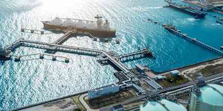 LNG (Liquified Natural Gas) tanker anchored in Gas terminal gas tanks for storage