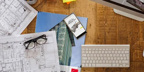 Collection of architecture design documents on a desk