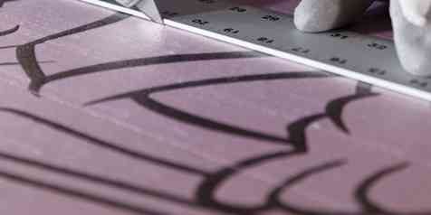 Contractor cutting FOAMULAR XPS insulation for installation