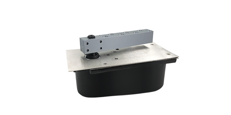 A black and stainless steel device to close the 4400-T & 4400-Wood Fleetwood Pivot Door