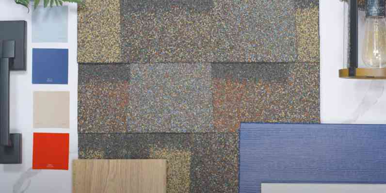 Lay flat view Shingle swatch with paint chip samples in two shades of blue, a black door handle, and a lantern.