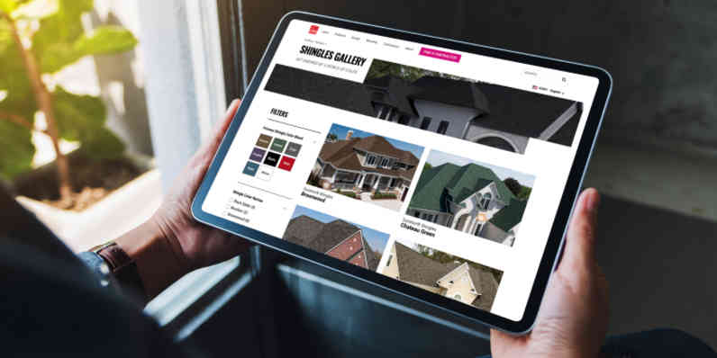 Person using a tablet with the Owens Corning shingle gallery page open