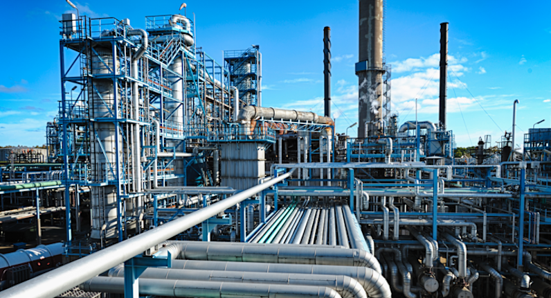 A factory site with pipes and equipment