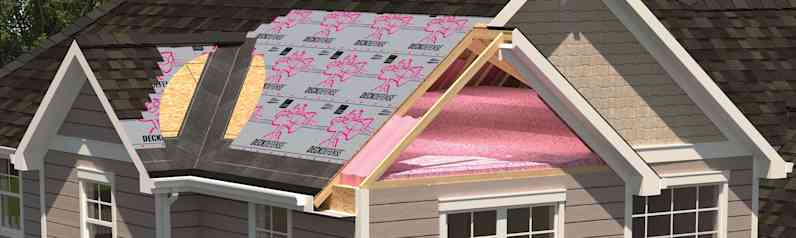 Residential roof with shingles torn away to reveal underlayment products on the roof.