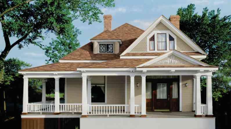 Photo of a tan house with tan/brown Supreme® Shingles on the roof