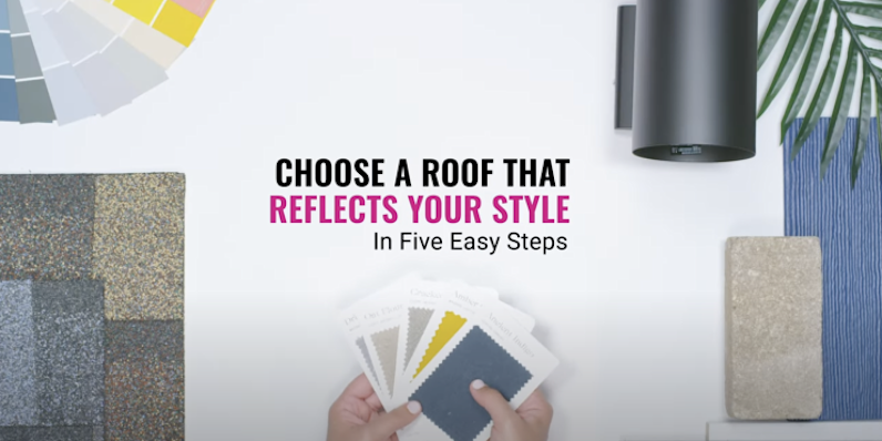 Overhead view of hands holding color swatches with shingle samples and color palettes spread out