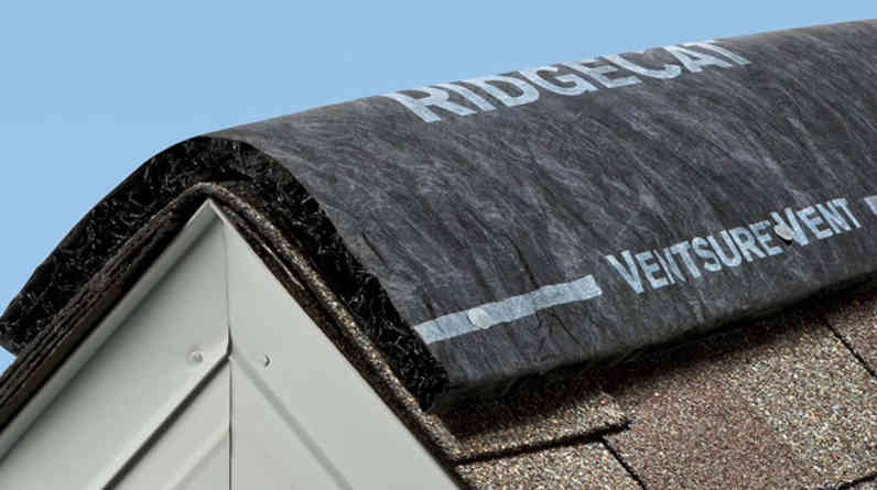 Closeup photo of a roof with VentSure® RidgeCat® Rolled Ridge Vent