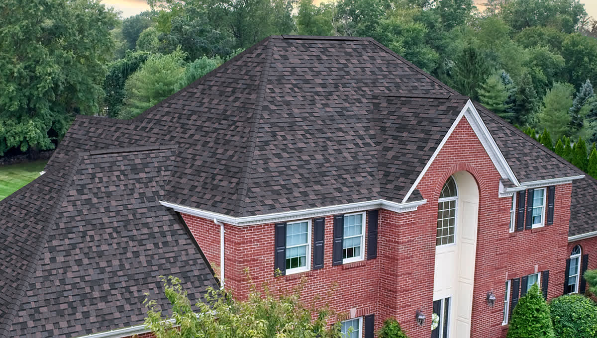 House with TruDefinition® Duration® Architectural Shingles in Midnight Plum
