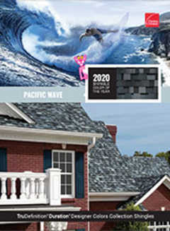 Man surfing in a curled wave composited atop a rocky coast leading to blue water with whitecap waves. Featured next to the scene is a swatch of Pacific Wave shingles, the 2020 Shingle Color of the Year, which are pale blue mixed with dark and light gray granules. At the bottom is a house with Pacific Wave shingles on the roof.