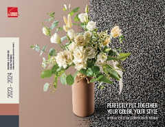 La portada de un folleto que muestra un ramo de flores sobre un fondo tostado con gránulos grises en un lado