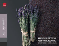 A two story house with Midnight Plum colored roof