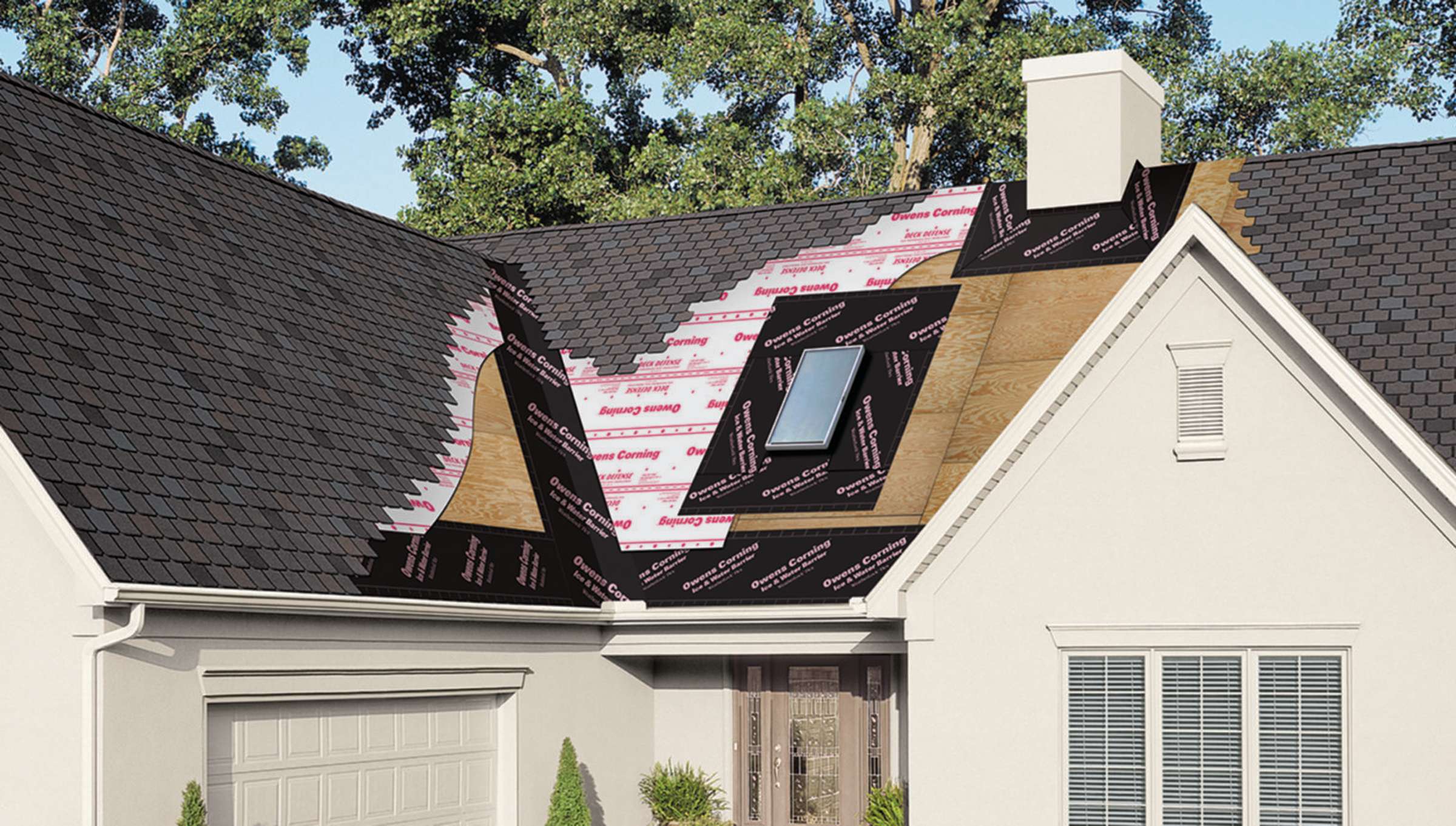 Photo of a house with a cut out in the roof, exposing all layers of the Owens Corning Total Protection Roofing System